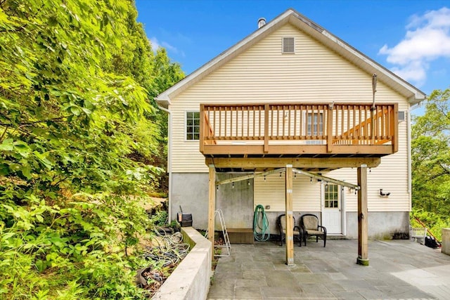 254 Farm To Market Rd, Brewster, NY 10509 - rear view of house with a patio area and a deck