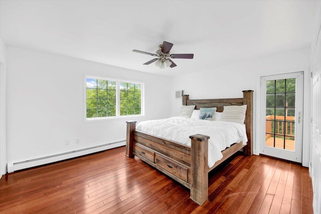 254 Farm To Market Rd, Brewster, NY 10509 - bedroom featuring baseboard heating, access to outside, hardwood / wood-style floors, and a ceiling fan