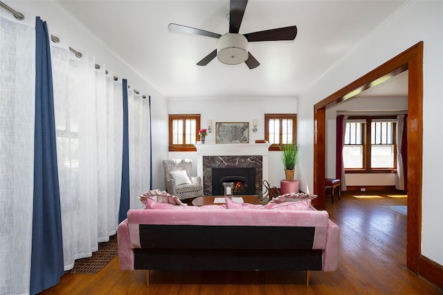 7365 S Broadway, Red Hook, NY 12571 - living area featuring a high end fireplace, ceiling fan, and wood finished floors