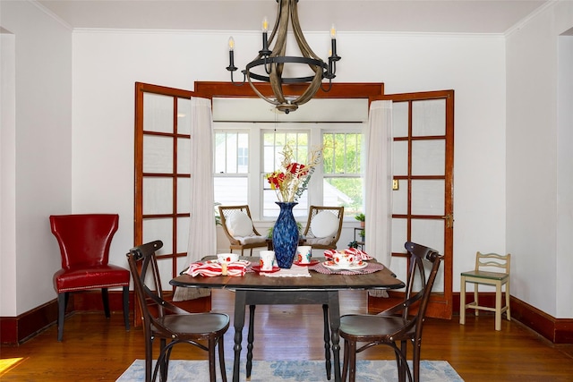 7365 S Broadway, Red Hook, NY 12571 - dining room featuring an inviting chandelier, baseboards, ornamental molding, and wood finished floors