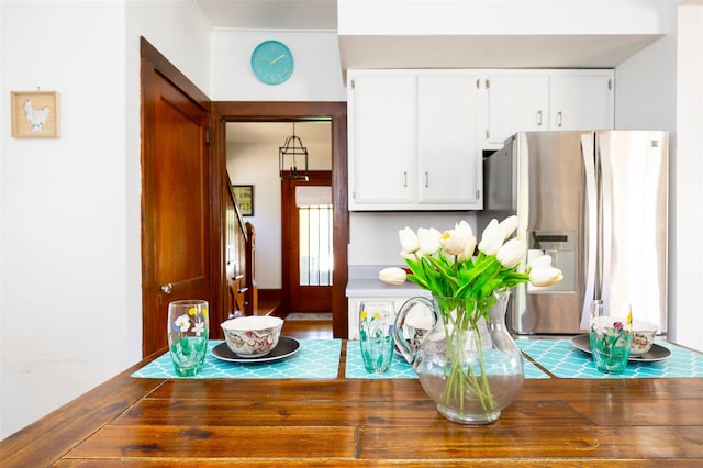7365 S Broadway, Red Hook, NY 12571 - kitchen featuring white cabinets and stainless steel fridge with ice dispenser