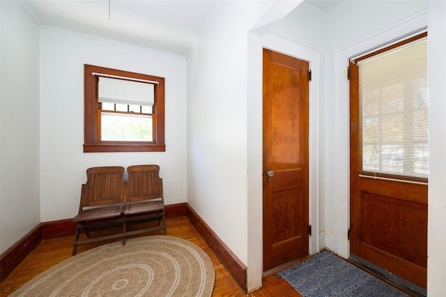 7365 S Broadway, Red Hook, NY 12571 - foyer with crown molding, baseboards, and wood finished floors