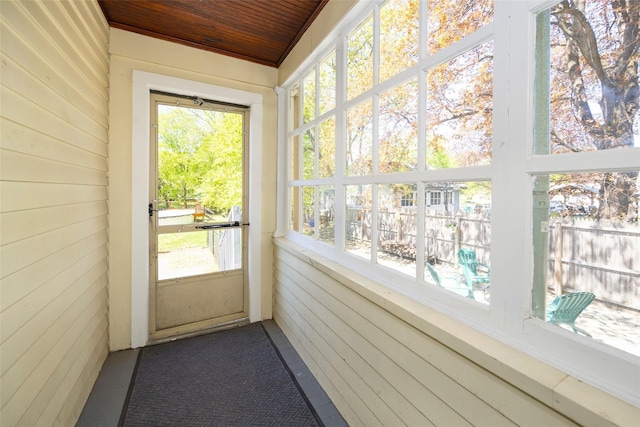 7365 S Broadway, Red Hook, NY 12571 - unfurnished sunroom with wooden walls, plenty of natural light, and wood ceiling