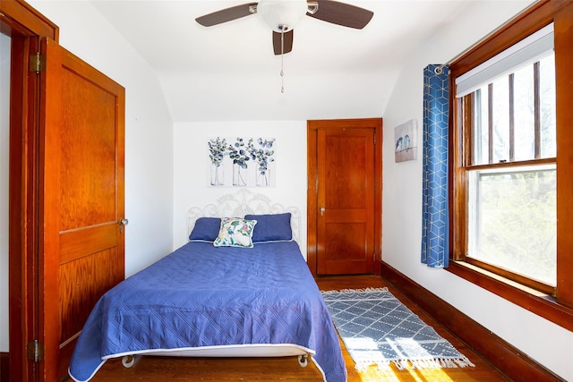 7365 S Broadway, Red Hook, NY 12571 - bedroom with ceiling fan, multiple windows, wood finished floors, and lofted ceiling