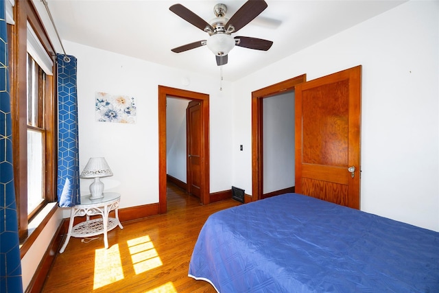 7365 S Broadway, Red Hook, NY 12571 - bedroom with baseboards, a ceiling fan, and wood finished floors