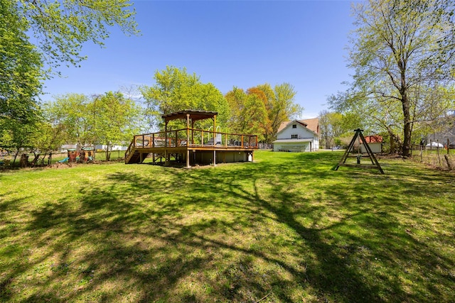 7365 S Broadway, Red Hook, NY 12571 - view of yard featuring a playground, a wooden deck, and fence
