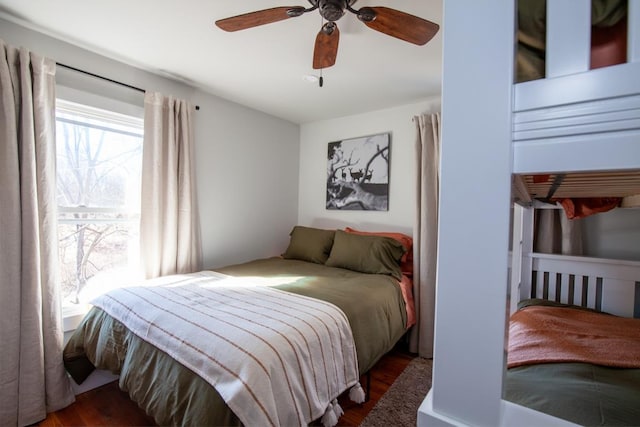 bedroom with ceiling fan and wood finished floors