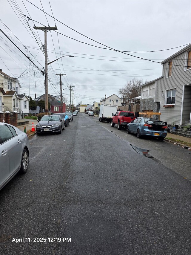 view of street with street lighting and a residential view