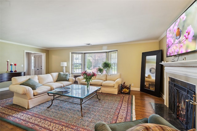 26 Woodgreen Ln, East Hills, NY 11577 - living area with a fireplace with flush hearth, ornamental molding, baseboards, and wood finished floors