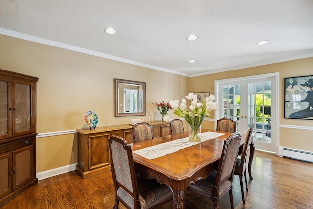 26 Woodgreen Ln, East Hills, NY 11577 - dining space with baseboard heating, dark wood-type flooring, crown molding, baseboards, and recessed lighting