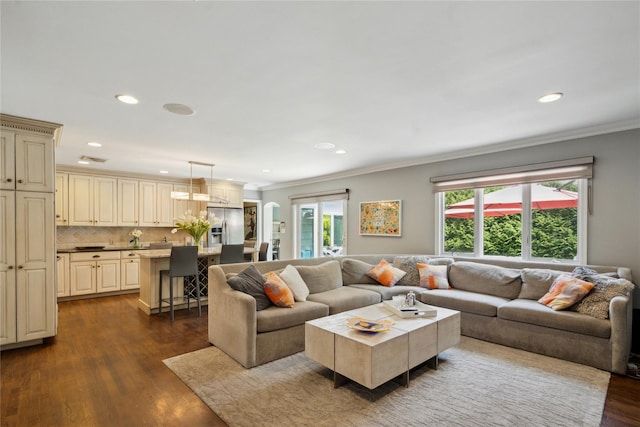 26 Woodgreen Ln, East Hills, NY 11577 - living room featuring crown molding, dark wood finished floors, and recessed lighting