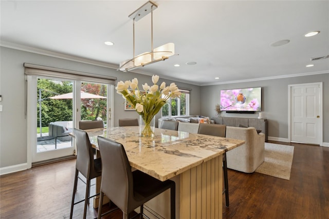 26 Woodgreen Ln, East Hills, NY 11577 - dining area with plenty of natural light, crown molding, dark wood-type flooring, baseboards, and recessed lighting