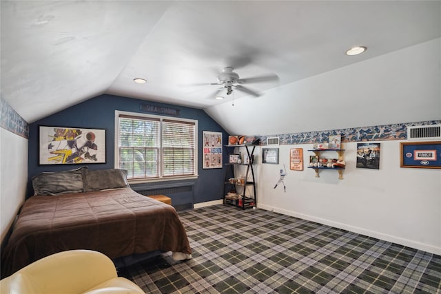 26 Woodgreen Ln, East Hills, NY 11577 - bedroom with lofted ceiling, dark carpet, baseboards, a ceiling fan, and radiator