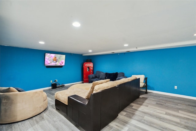 26 Woodgreen Ln, East Hills, NY 11577 - home theater room featuring recessed lighting, light wood-style floors, and baseboards