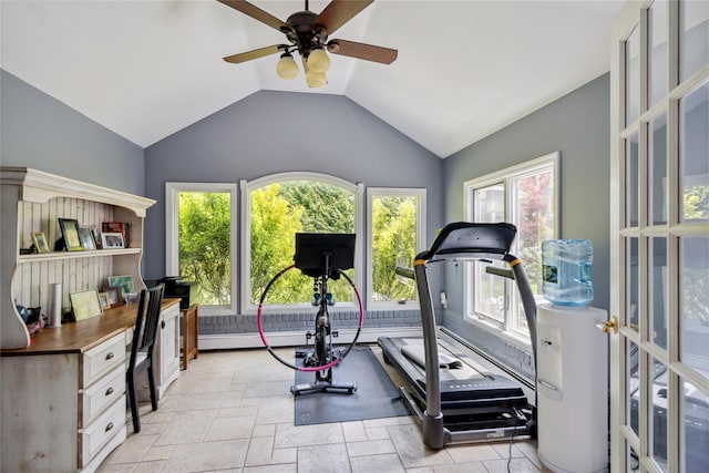 26 Woodgreen Ln, East Hills, NY 11577 - exercise room with lofted ceiling, stone tile flooring, and a ceiling fan