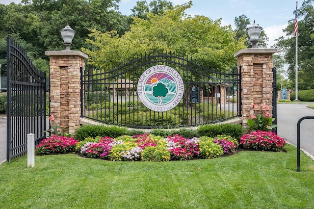 26 Woodgreen Ln, East Hills, NY 11577 - community sign with a gate