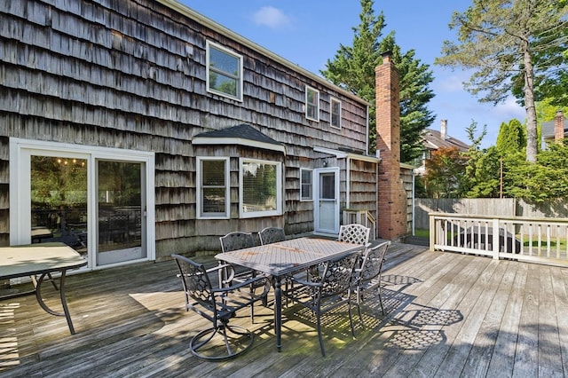 126 Carley Ave, Huntington, NY 11743 - wooden deck featuring outdoor dining space and fence