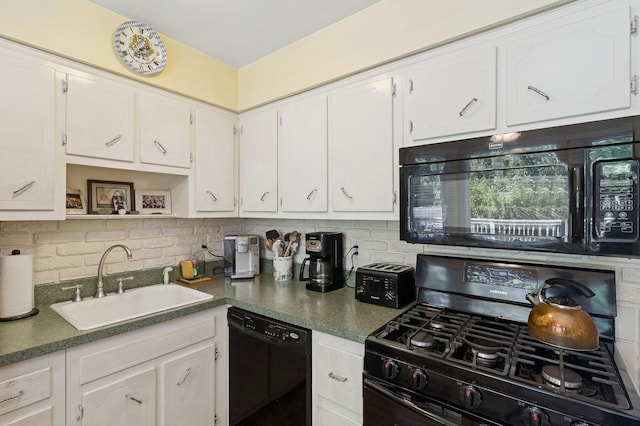 126 Carley Ave, Huntington, NY 11743 - kitchen with black appliances, a sink, backsplash, and white cabinetry