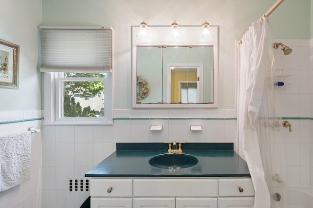 126 Carley Ave, Huntington, NY 11743 - full bath featuring tile walls, vanity, and shower / bath combo