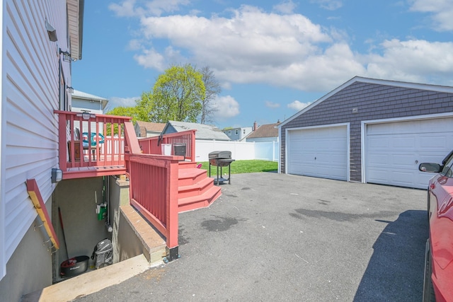 garage with fence