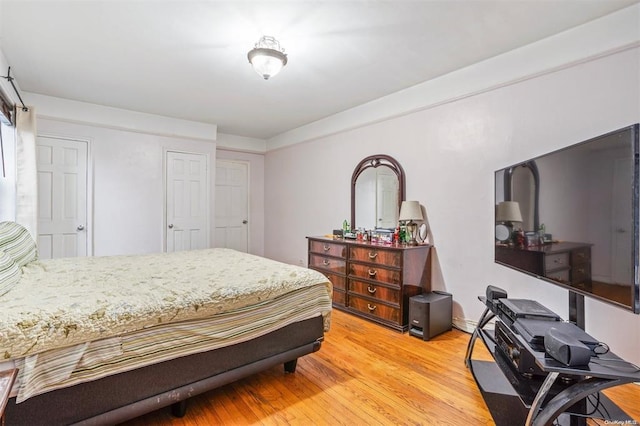 bedroom featuring light wood-type flooring