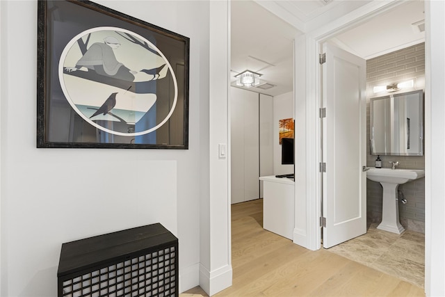 hall with wood finished floors