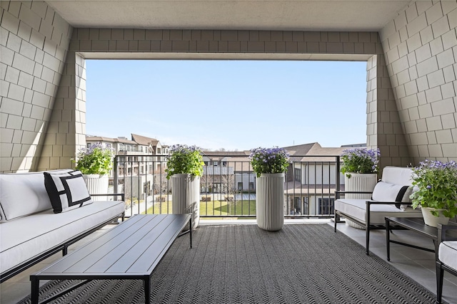 balcony featuring a residential view