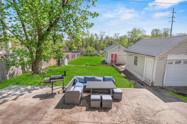 119 Western Hwy, West Nyack, NY 10994 - view of yard featuring an outdoor structure, fence, a patio, an outdoor hangout area, and a storage unit
