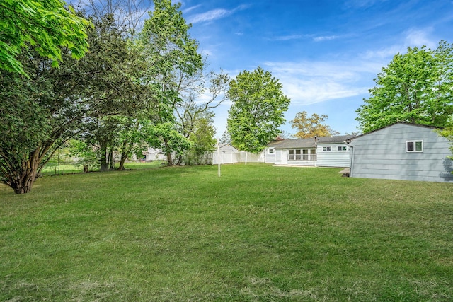 view of yard with fence