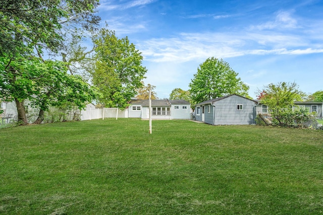 view of yard with fence