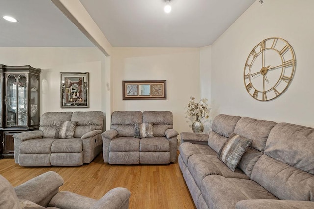 living area featuring recessed lighting and light wood finished floors