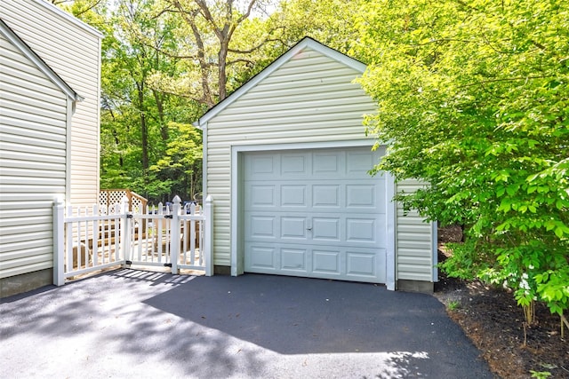 352 Gibbs Pond Rd, Nesconset, NY 11767 - detached garage featuring asphalt driveway