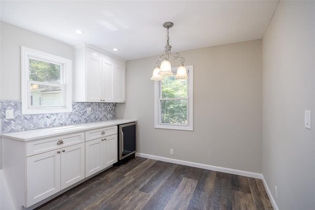 352 Gibbs Pond Rd, Nesconset, NY 11767 - kitchen featuring dark wood-style floors, white cabinets, backsplash, wine cooler, and recessed lighting