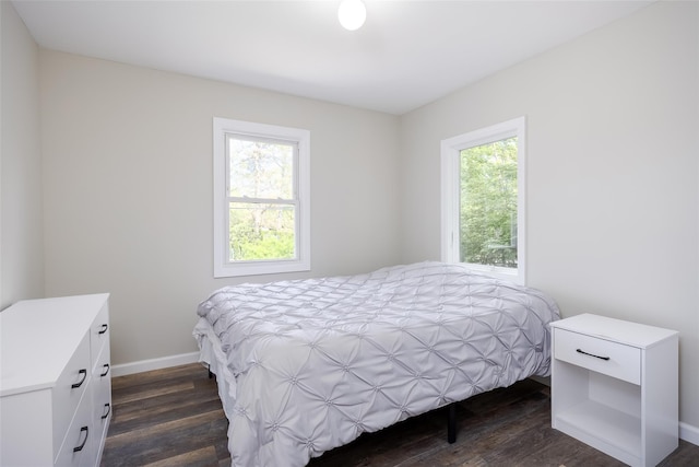 352 Gibbs Pond Rd, Nesconset, NY 11767 - bedroom with dark wood-style floors and baseboards