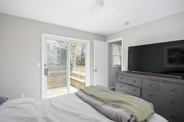 352 Gibbs Pond Rd, Nesconset, NY 11767 - bedroom featuring access to exterior and baseboards