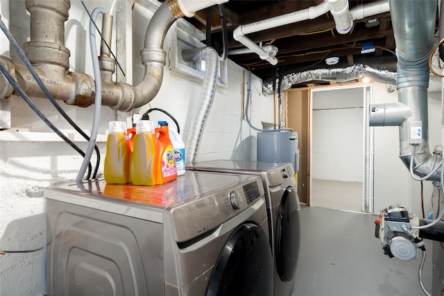 352 Gibbs Pond Rd, Nesconset, NY 11767 - washroom featuring washing machine and dryer and electric water heater