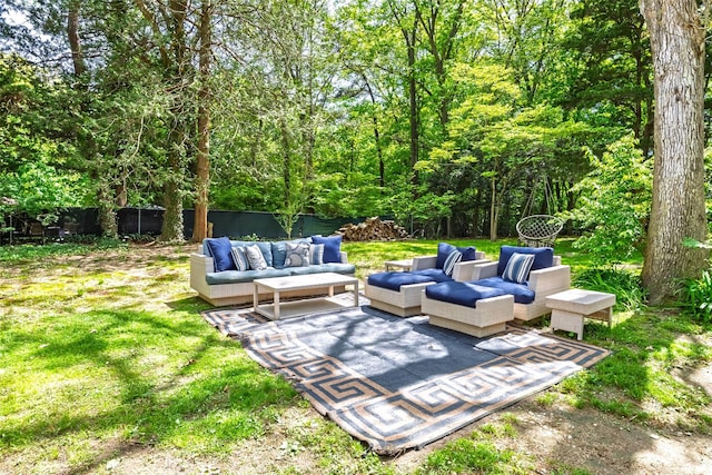 352 Gibbs Pond Rd, Nesconset, NY 11767 - view of yard with an outdoor hangout area, a patio, fence, and a forest view