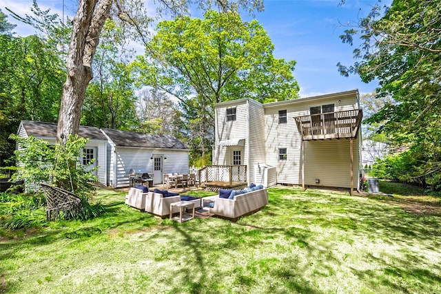 352 Gibbs Pond Rd, Nesconset, NY 11767 - rear view of property featuring an outdoor hangout area, a yard, a deck, and an outdoor structure