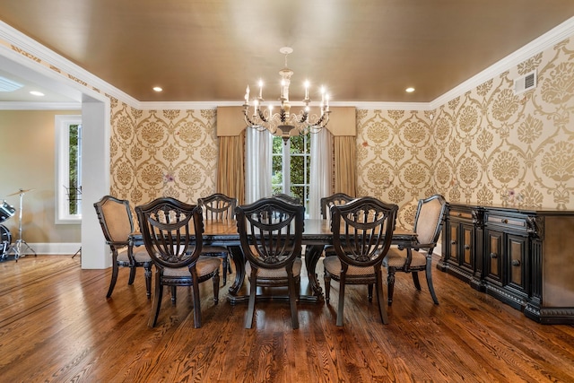 9 Earle Dr, Muttontown, NY 11791 - dining room with wallpapered walls, a chandelier, plenty of natural light, wood finished floors, and crown molding
