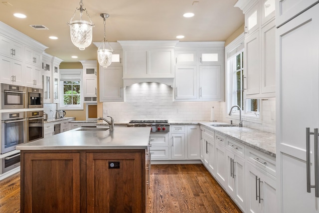 9 Earle Dr, Muttontown, NY 11791 - kitchen featuring appliances with stainless steel finishes, a warming drawer, white cabinetry, and recessed lighting