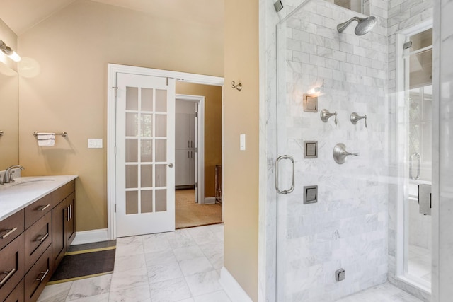 9 Earle Dr, Muttontown, NY 11791 - full bath with a stall shower, vanity, marble look tile flooring, and vaulted ceiling