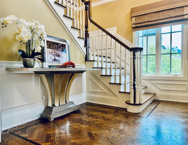 9 Earle Dr, Muttontown, NY 11791 - staircase featuring a decorative wall