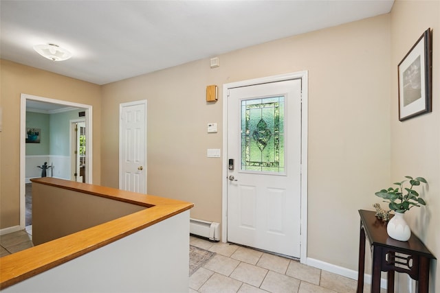 22 Washington Dr, Centerport, NY 11721 - entrance foyer featuring baseboard heating, light tile patterned flooring, and baseboards