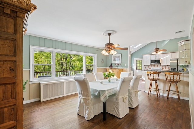22 Washington Dr, Centerport, NY 11721 - dining room with ceiling fan, dark wood finished floors, and vaulted ceiling