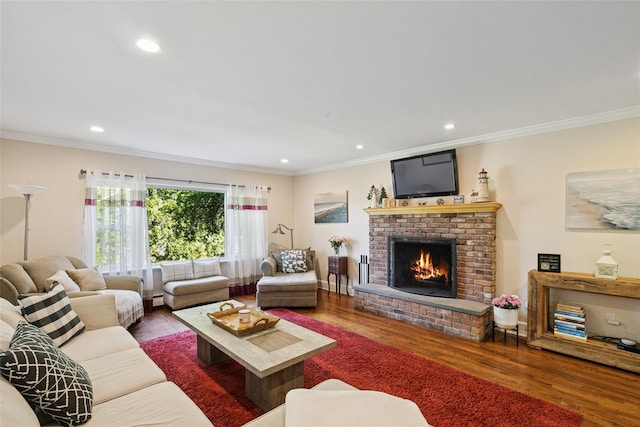 22 Washington Dr, Centerport, NY 11721 - living room featuring ornamental molding, a fireplace, wood finished floors, recessed lighting, and a baseboard radiator