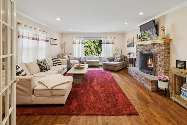 22 Washington Dr, Centerport, NY 11721 - living room featuring ornamental molding, a brick fireplace, wood finished floors, and recessed lighting