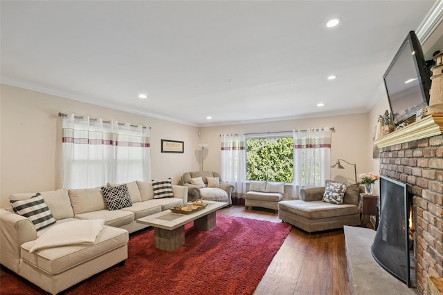 22 Washington Dr, Centerport, NY 11721 - living area featuring hardwood / wood-style floors, a fireplace, ornamental molding, and recessed lighting