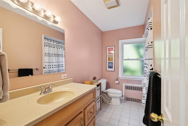 22 Washington Dr, Centerport, NY 11721 - full bathroom featuring radiator, vanity, tile patterned floors, and toilet