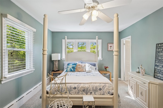 22 Washington Dr, Centerport, NY 11721 - bedroom featuring a baseboard heating unit, a ceiling fan, light carpet, and baseboards