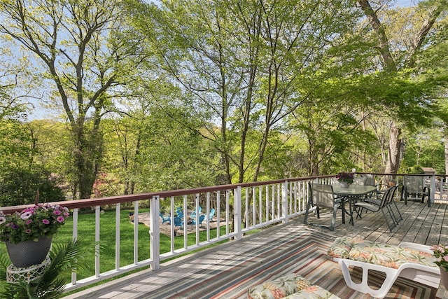 22 Washington Dr, Centerport, NY 11721 - wooden terrace with outdoor dining area and a lawn